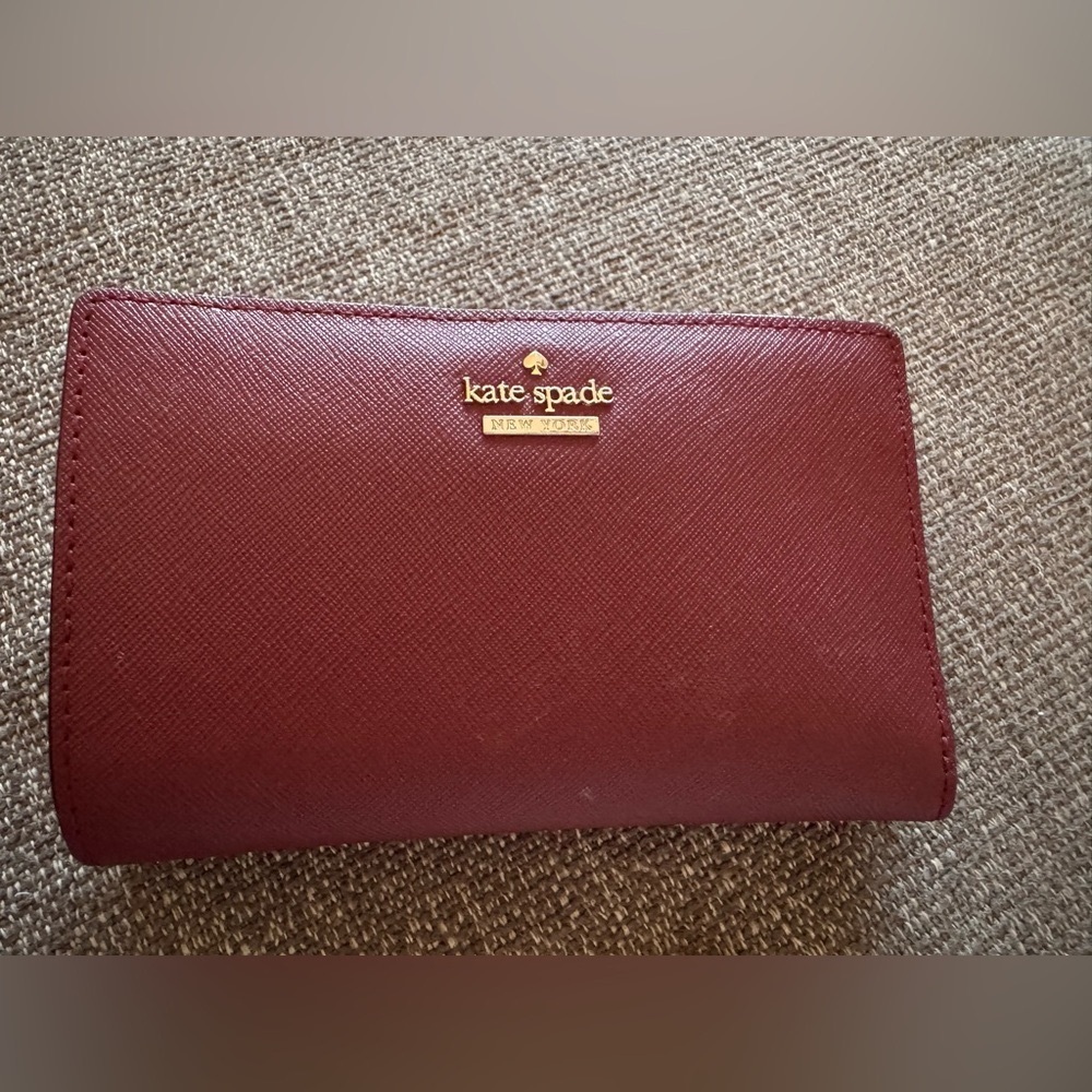 Kate Spade Wallet in a Sienna burgundy color with tag & care card